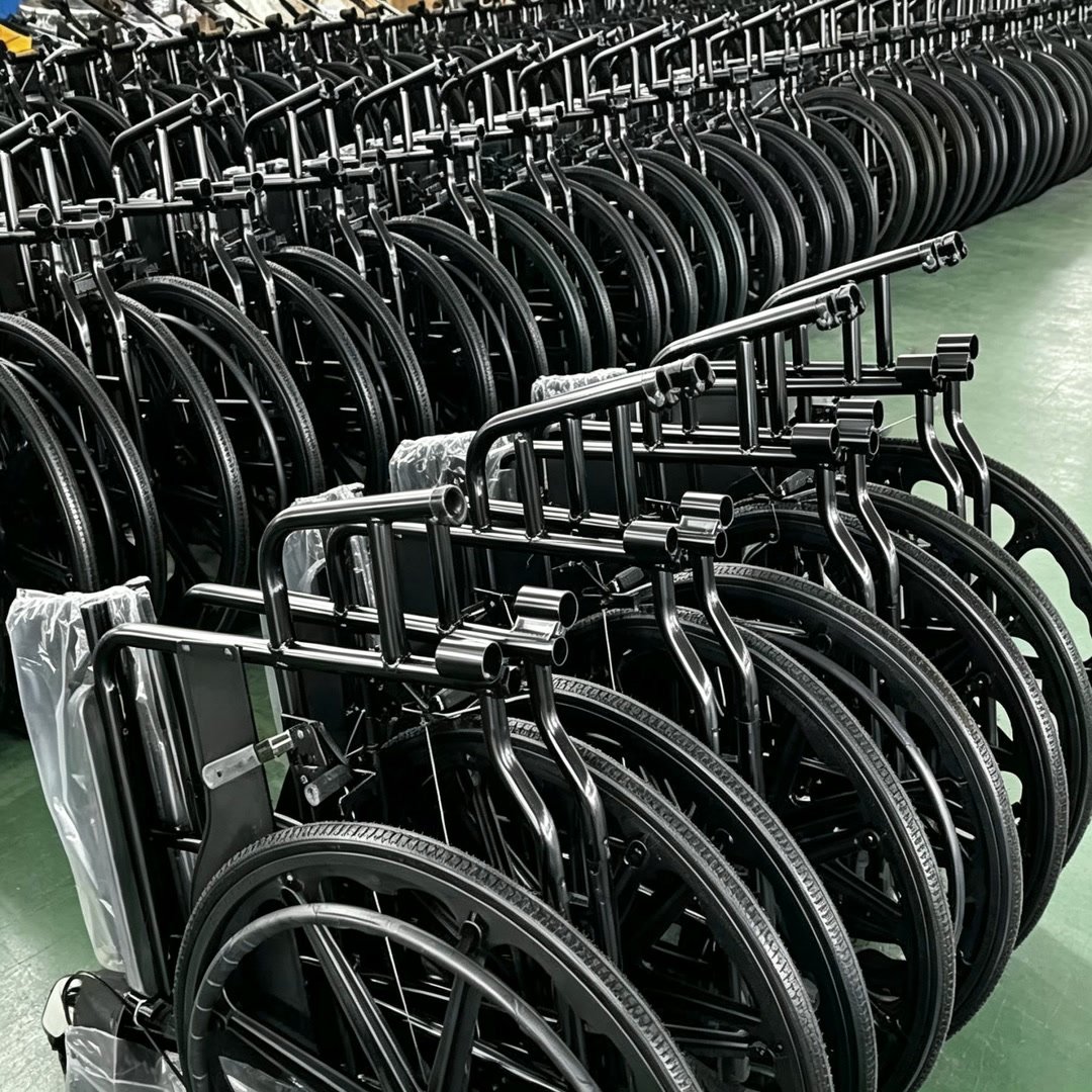 Rows of manual wheelchairs prepared in finished-goods storage